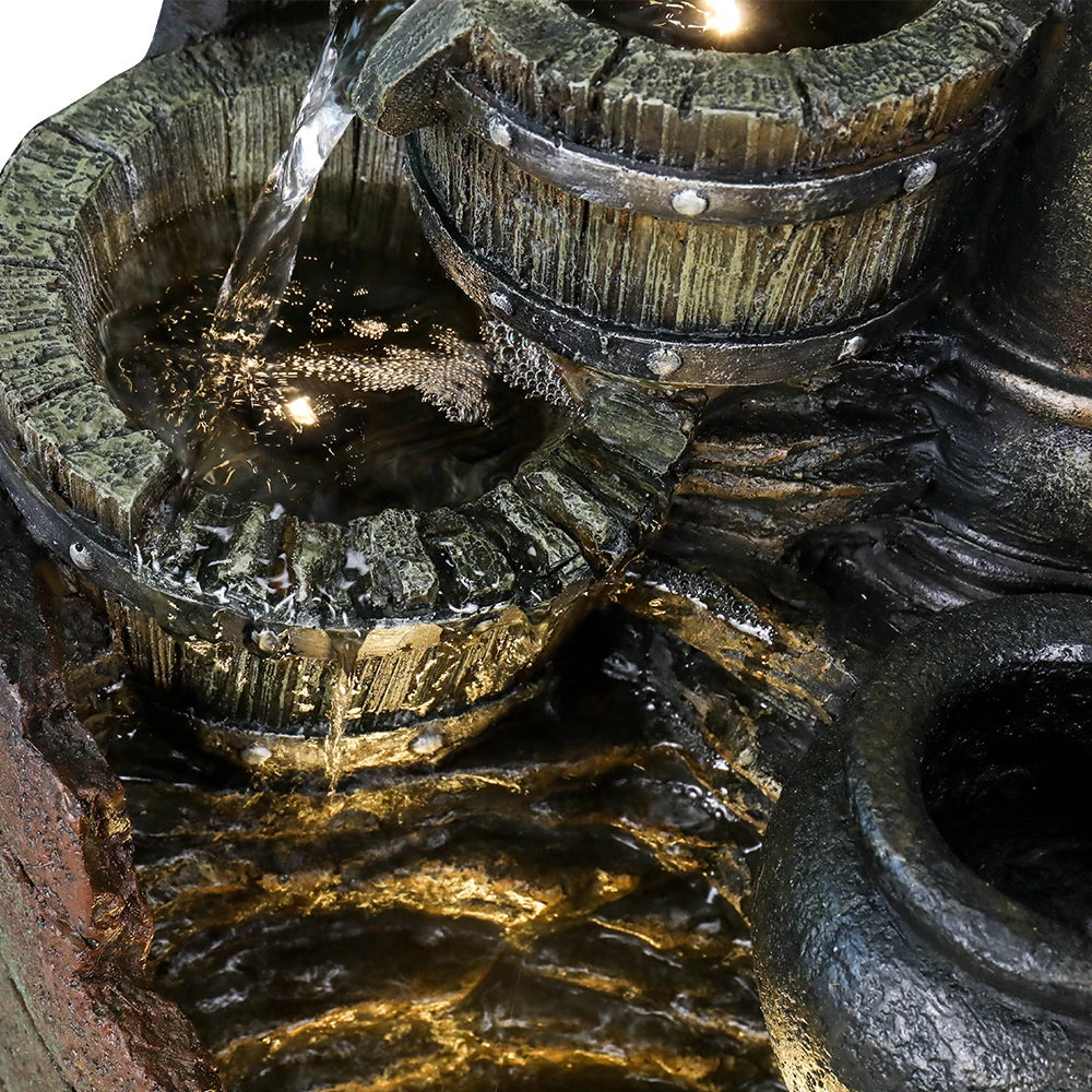 Comparison shot of a traditional concrete bird bath next to a fiber concrete bird bath buddha fountain