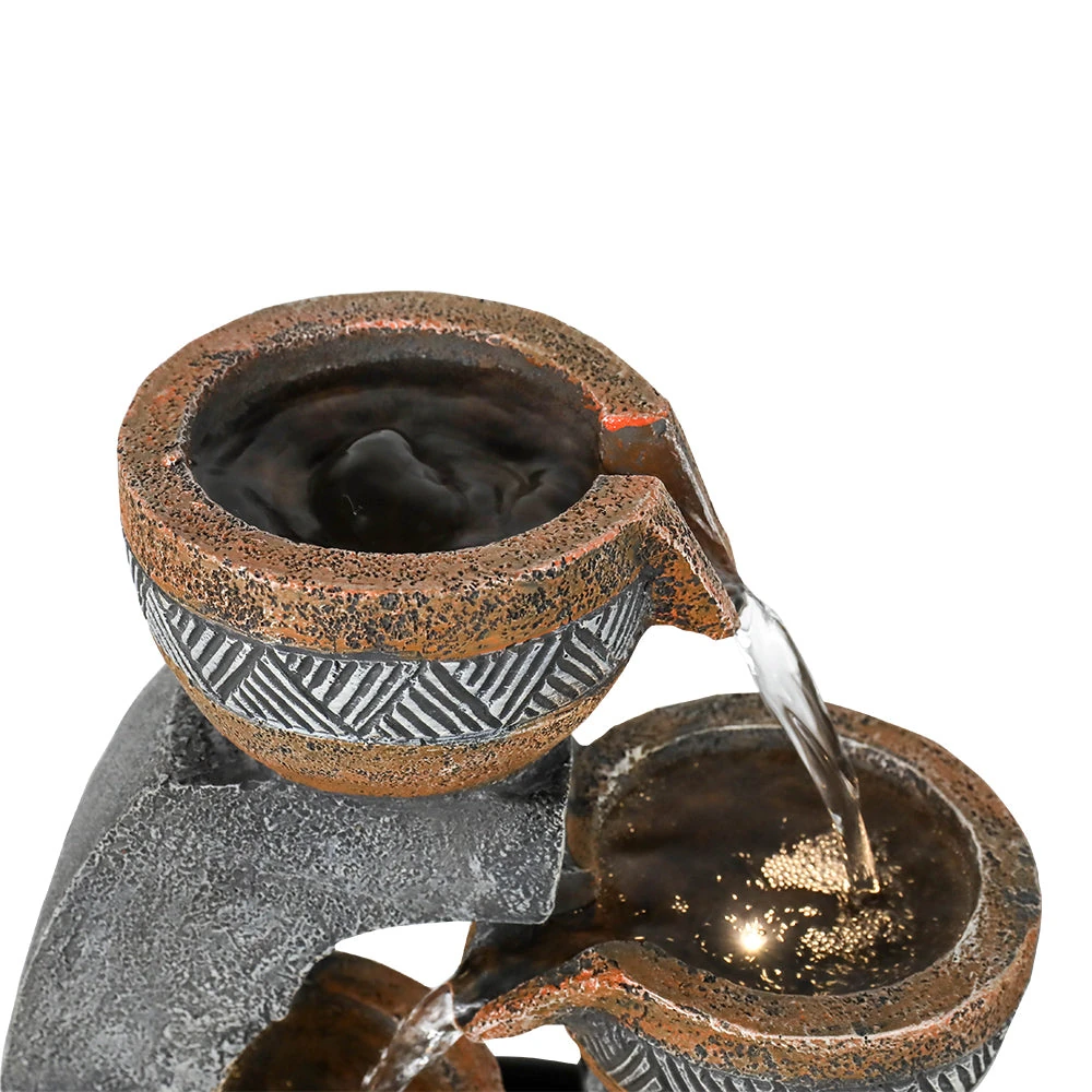 concrete bird bath bowls only - A concrete bird bath bowl only in a Pacific Northwest garden with moss and ferns surrounding it, showing natural patina development